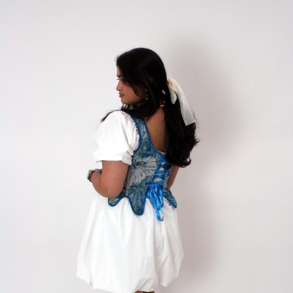 Arushi in a classy game day fit in UNC signature blue and white